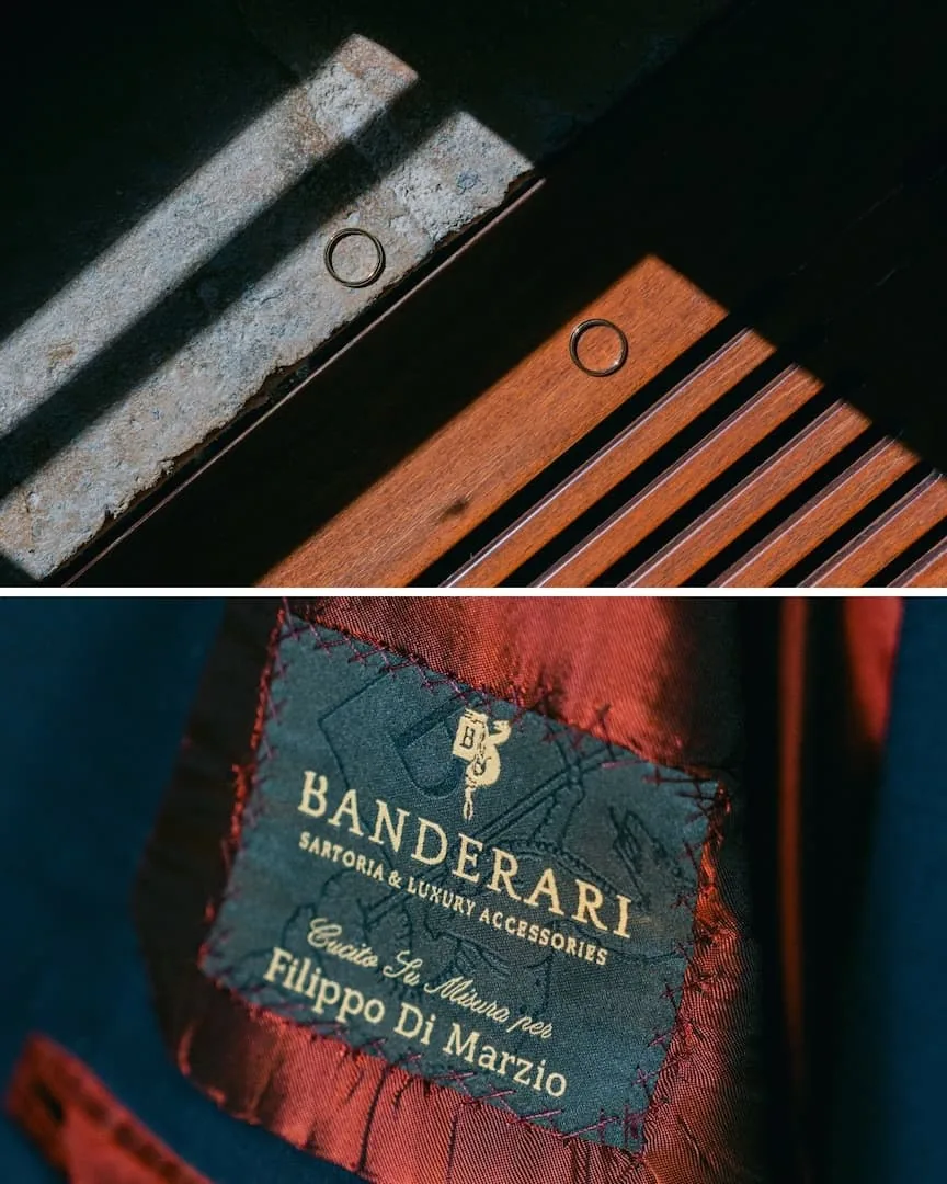 Close-up of the wedding rings and a bespoke tailored jacket label, luxury groom details