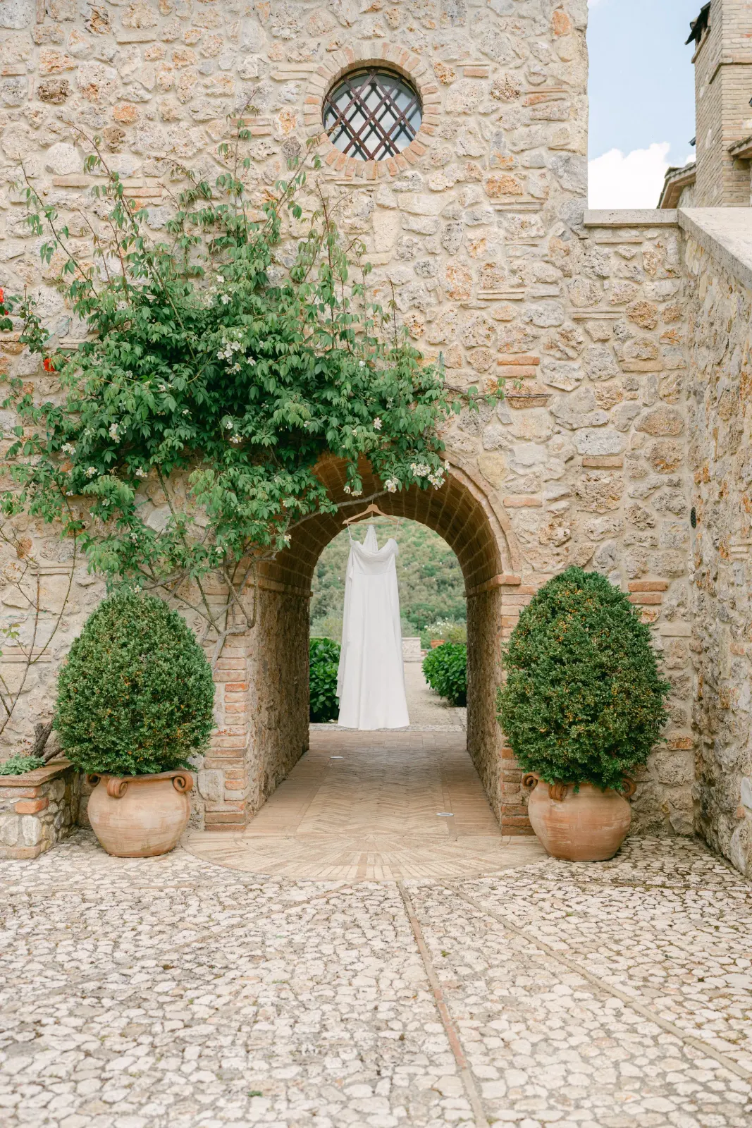 Wedding dress archway garden view